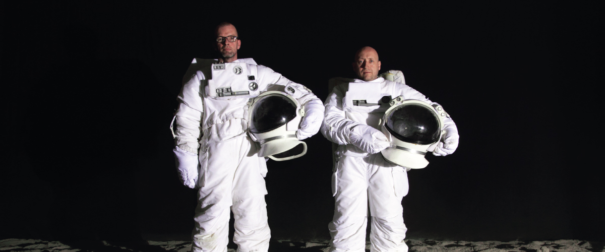 Wood and Harrison as astronauts, masthead